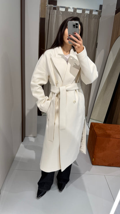 Пальто молочне