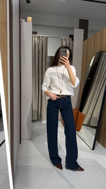 Джинси з бахромою знизу