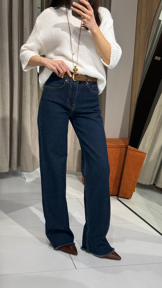 Джинси з бахромою знизу